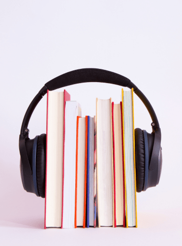 Headphone around books.