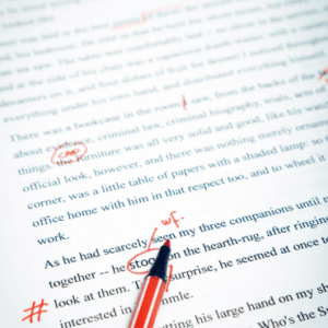Copy edited text and red pen.