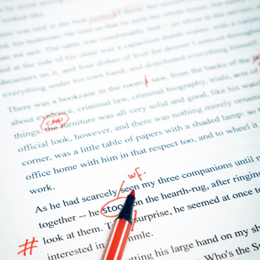 Proofread text document with annotations. Red pen.